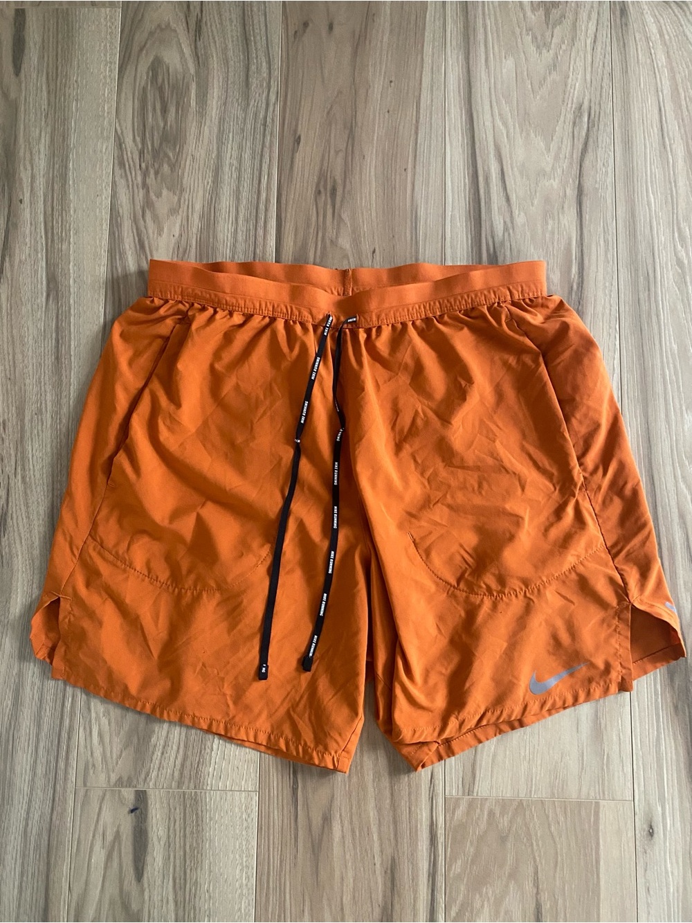Nike Men's Bright Orange Athletic Shorts with Black Drawstring